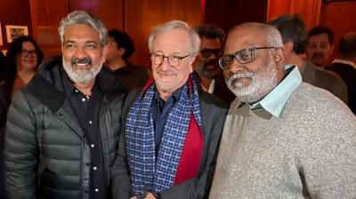 "I just met GOD!!!" the filmmaker, also known for blockbuster "Baahubali" movies, wrote in the caption. — Twitter