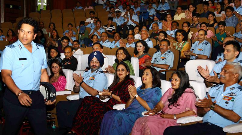 At the special screening of 'Sachin A Billion Dreams' held for Indian Armed Forces, Honorary Group Captain Sachin Tendulkar was joined by Air Chief Marshal BS Dhanoa along with personnel and their families from Indian Air Force, Indian Army and Indian Navy. (Photo: PTI) At the special screening of 'Sachin A Billion Dreams' held for Indian Armed Forces, Honorary Group Captain Sachin Tendulkar was joined by Air Chief Marshal BS Dhanoa along with personnel and their families from Indian Air Force, Indian Army and Indian Navy. (Photo: PTI)