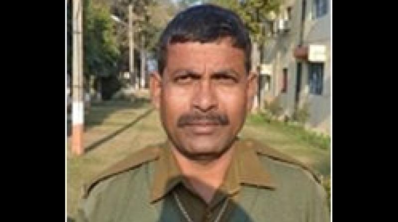 BSF head constable RP Hazra, who hails from Murshidabad in West Bengal, has served for about 27 years in the border guarding force. (Photo: ANI) BSF head constable RP Hazra, who hails from Murshidabad in West Bengal, has served for about 27 years in the border guarding force. (Photo: ANI)