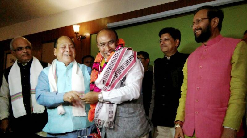 Nongthombam Biren Singh is greeted after he was elected at BJP legislature party leader in Imphal on Monday. Union Power Minister and BJP observer Piyush Goyal and HRD Minister Prakash Javadekar are also seen. (Photo: PTI) Nongthombam Biren Singh is greeted after he was elected at BJP legislature party leader in Imphal on Monday. Union Power Minister and BJP observer Piyush Goyal and HRD Minister Prakash Javadekar are also seen. (Photo: PTI)