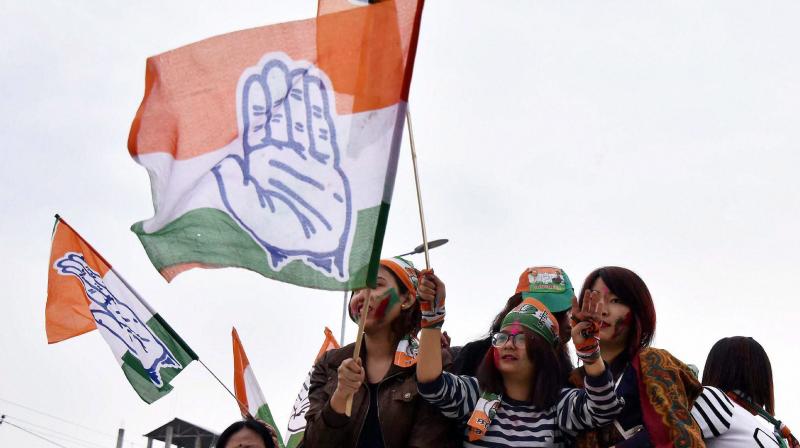 Supporters of Congress celebrate their candidate win Assembly elections in Imphal. (Photo: PTI) Supporters of Congress celebrate their candidate win Assembly elections in Imphal. (Photo: PTI)