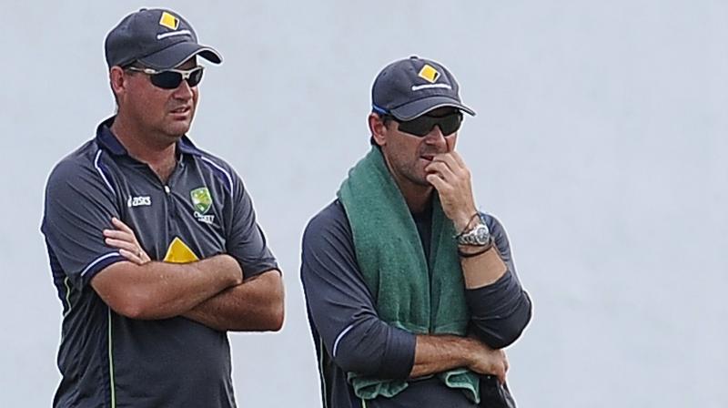 Justin Langer (right) believes than a victory in India will be an indelible redemption for the emotionally scarred national team. (Photo: AFP) Justin Langer (right) believes than a victory in India will be an indelible redemption for the emotionally scarred national team. (Photo: AFP)
