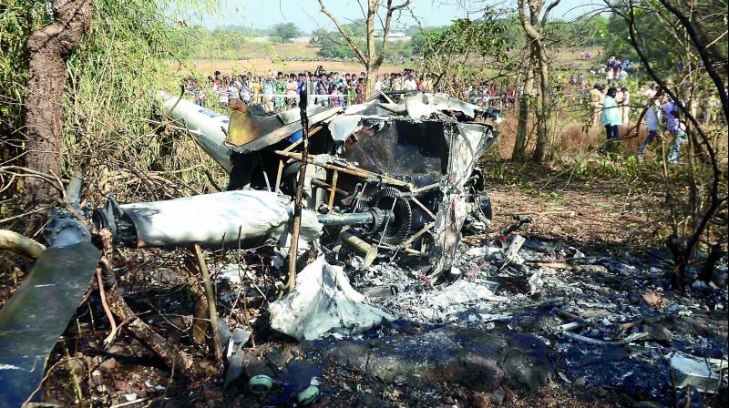 Mangled remains of a helicopter that crashed at Goregaon in Mumbai on Sunday. Locals who saw the crash managed to rescue the injured passengers. (Photo: DC) Mangled remains of a helicopter that crashed at Goregaon in Mumbai on Sunday. Locals who saw the crash managed to rescue the injured passengers. (Photo: DC)