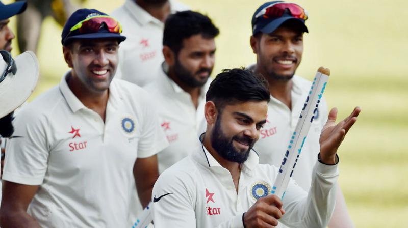 While Virat Kohli moved to second spot in ICC Test rankings following his brilliant batting performance against England in Mumbai Test, R Ashwin consolidated his position at top bowlers’ rankings following his 12-wicket haul in the Mumbai Test. (Photo: PTI) While Virat Kohli moved to second spot in ICC Test rankings following his brilliant batting performance against England in Mumbai Test, R Ashwin consolidated his position at top bowlers’ rankings following his 12-wicket haul in the Mumbai Test. (Photo: PTI)