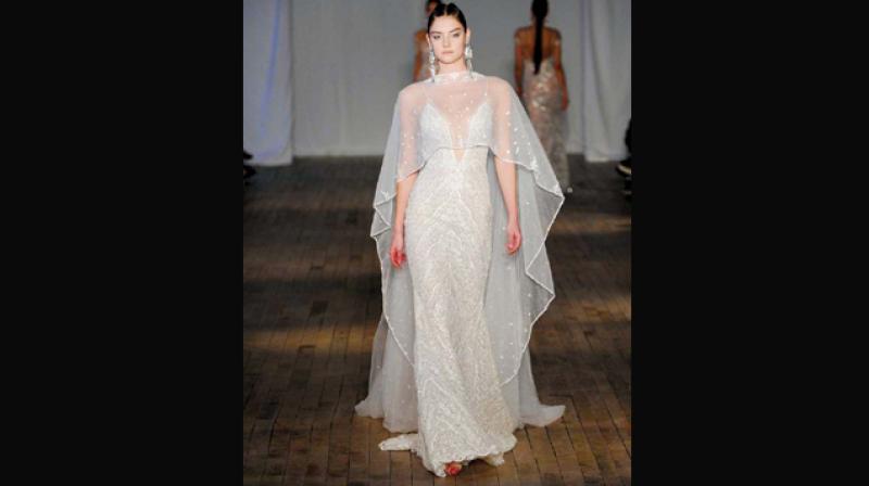 A transparent cape adds a sensous vibe. A transparent cape adds a sensous vibe.