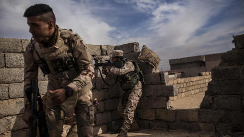 Iraqi soldiers open fire towards Islamic State militant positions in the Al-Intisar district in Mosul, Iraq. (Photo: AP) Iraqi soldiers open fire towards Islamic State militant positions in the Al-Intisar district in Mosul, Iraq. (Photo: AP)