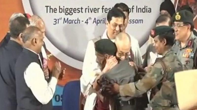 The Dalai Lama fell silent, saluted Das, held him tight, and wiped tears away from his eyes. (Photo: ANI) The Dalai Lama fell silent, saluted Das, held him tight, and wiped tears away from his eyes. (Photo: ANI)