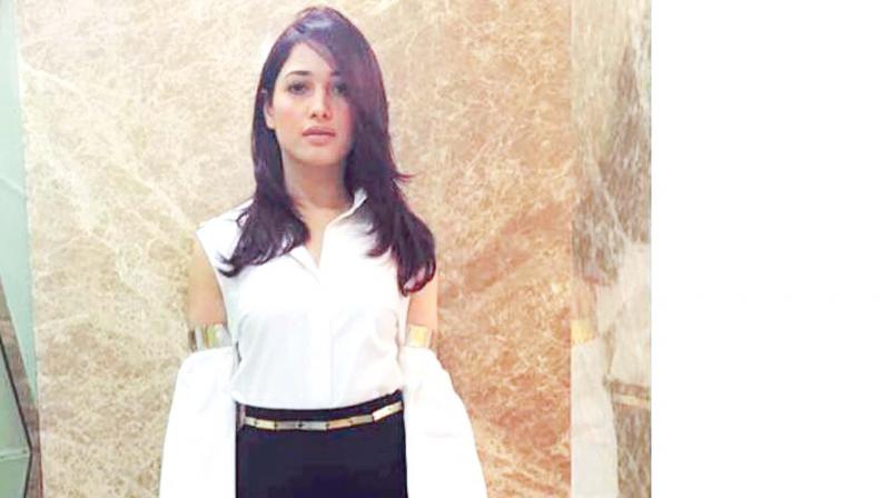 Flared, cuffed and cut out at the shoulders, Tamannaah Bhatia channels her inner diva in a deconstructed Nikhil Thampi creation Flared, cuffed and cut out at the shoulders, Tamannaah Bhatia channels her inner diva in a deconstructed Nikhil Thampi creation