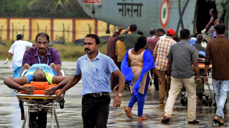 A fisherman being taken to a hospital in Thiruvananthapuram on Friday, after being rescued by defence personnel from rough seas. (Photo: PTI) A fisherman being taken to a hospital in Thiruvananthapuram on Friday, after being rescued by defence personnel from rough seas. (Photo: PTI)