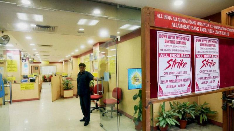 Bank unions have also demanded the government should reimburse them the cost of demonetisation. (Photo: Representational/PTI). Bank unions have also demanded the government should reimburse them the cost of demonetisation. (Photo: Representational/PTI).