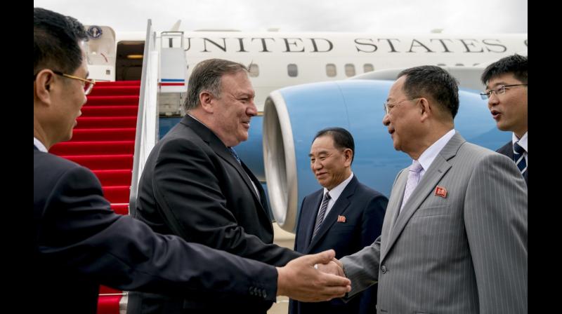 In this July 6, 2018 photo, U.S. Secretary of State Mike Pompeo, second from left, is greeted by North Korean Director of the United Front Department Kim Yong Chol, center, and North Korean Foreign Minister Ri Yong Ho, second from right, as he arrives at Sunan International Airport in Pyongyang, North Korea. (Photo: AP | File) In this July 6, 2018 photo, U.S. Secretary of State Mike Pompeo, second from left, is greeted by North Korean Director of the United Front Department Kim Yong Chol, center, and North Korean Foreign Minister Ri Yong Ho, second from right, as he arrives at Sunan International Airport in Pyongyang, North Korea. (Photo: AP | File)