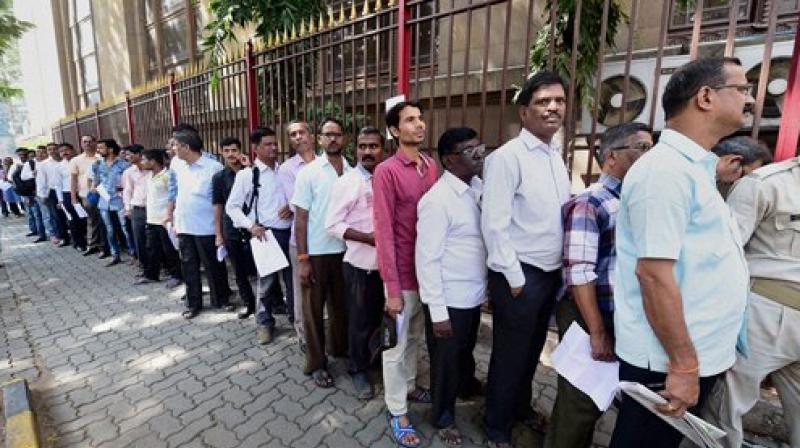 Pandey, a retired BSNL employee, collapsed after standing in the queue for 30 minutes outside a bank branch in Makronia, his son Vinod Kumar said. (Representational image) Pandey, a retired BSNL employee, collapsed after standing in the queue for 30 minutes outside a bank branch in Makronia, his son Vinod Kumar said. (Representational image)