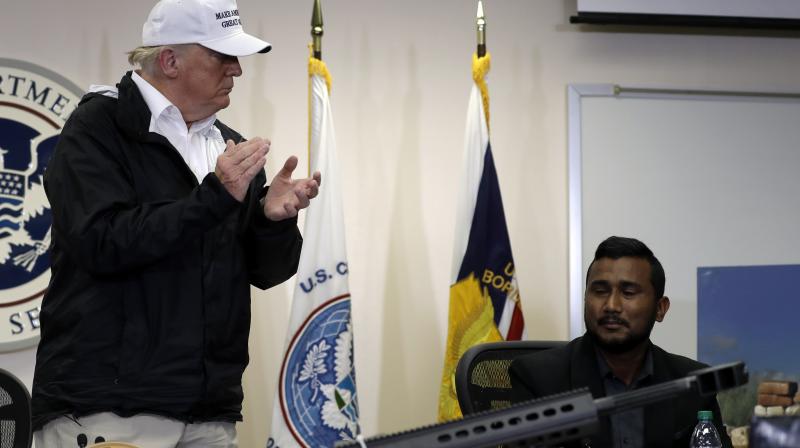 President Donald Trump recognizes Reggie Singh, brother of slain California police officer Ronil Singh at roundtable on immigration and border security at US Border Patrol McAllen Station, during a visit to southern border on Thursday. (Photo: AP) President Donald Trump recognizes Reggie Singh, brother of slain California police officer Ronil Singh at roundtable on immigration and border security at US Border Patrol McAllen Station, during a visit to southern border on Thursday. (Photo: AP)