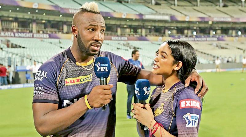 Andre Russell of Kolkata Knight Riders interviews his wife Jassym Lora after the IPL match against Mumbai at the Eden Gardens. DC File Photo