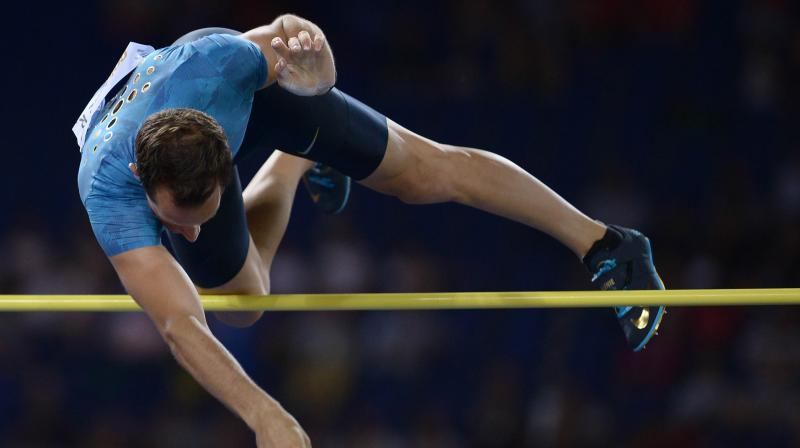 Frances Renaud Lavillenie clears the jumps bar during the pole vault event at the Golden Gala, the 4th stage of IAAF Diamond League in Rome. AFP Photo