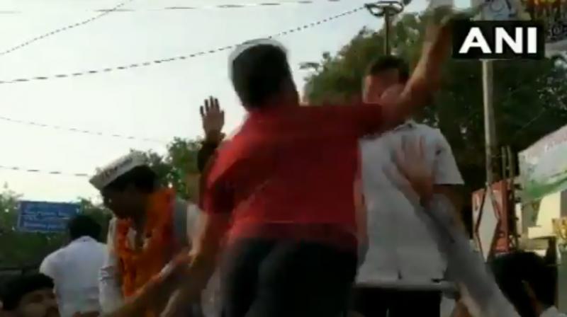 A man slaps Arvind Kejriwal. (Photo: Screengrab of ANI video) A man slaps Arvind Kejriwal. (Photo: Screengrab of ANI video)