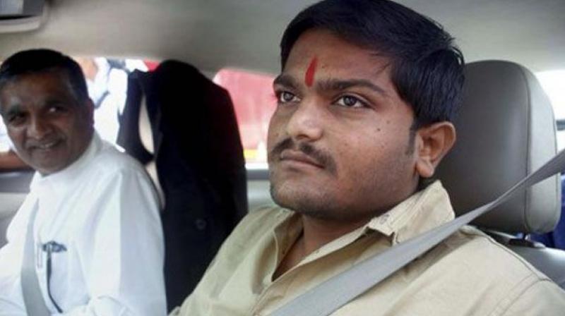 Quota spearhead Hardik Patel met Gujarat Congress president Bharatsinh Solanki on Saturday. (Photo: PTI/File) Quota spearhead Hardik Patel met Gujarat Congress president Bharatsinh Solanki on Saturday. (Photo: PTI/File)