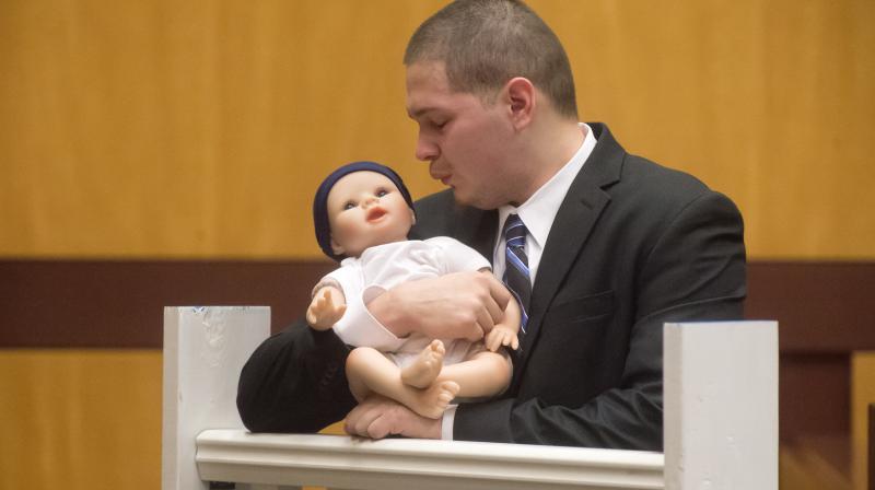 Tony Moreno demonstrates to the jury how he held his son Aaden on the railing of the Arrigoni Bridge in the final moments of Aaden's life, during Moreno's trial Thursday. (Photo: AP) Tony Moreno demonstrates to the jury how he held his son Aaden on the railing of the Arrigoni Bridge in the final moments of Aaden's life, during Moreno's trial Thursday. (Photo: AP)