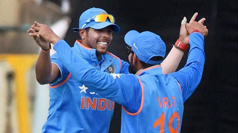 Umesh Yadav took an absolute screamer of a catch to dismiss Corey Anderson in the first India-New Zealand ODI in Dharamsala. (Photo: PTI) Umesh Yadav took an absolute screamer of a catch to dismiss Corey Anderson in the first India-New Zealand ODI in Dharamsala. (Photo: PTI)