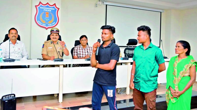 Dinesh Jena (left) after reuniting with his brother Deepak and their mother on Wednesday. Dinesh Jena (left) after reuniting with his brother Deepak and their mother on Wednesday.