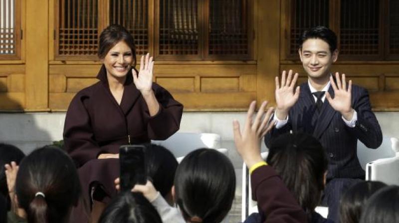 The video showed Trump at ease with South Korean teenagers in school uniforms at an event where the first lady gave a speech. (Photo: AP) The video showed Trump at ease with South Korean teenagers in school uniforms at an event where the first lady gave a speech. (Photo: AP)