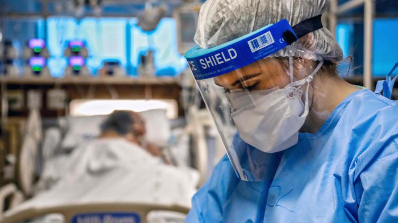 A doctor treats a patient infected with the novel coronavirus COVID-19 at the Intensive Care Unit of the Hospital de Clinicas, in Porto Alegre, Brazil. AFP photo