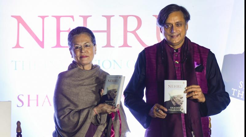 Former Congress president Sonia Gandhi with Congress MP Shashi Tharoor during latter's book 'Nehru: The Invention of India' launch event in New Delhi on Tuesday. (Photo: PTI) Former Congress president Sonia Gandhi with Congress MP Shashi Tharoor during latter's book 'Nehru: The Invention of India' launch event in New Delhi on Tuesday. (Photo: PTI)