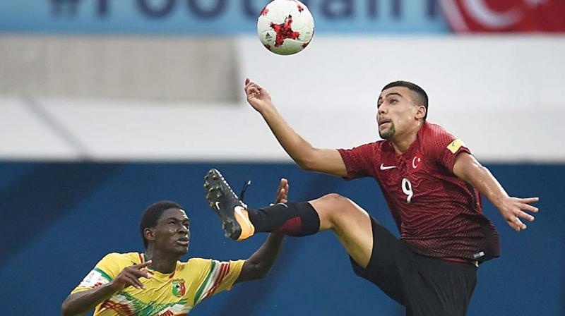 Action from the Turkey vs Mali match in Mumbai.(Photo: AP) Action from the Turkey vs Mali match in Mumbai.(Photo: AP)