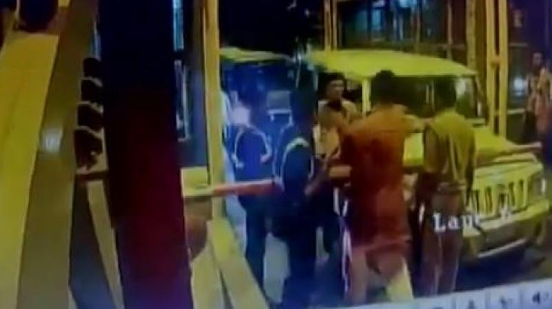 A BJP legislator thrashed a toll plaza staff after he was asked to pay the money for the vehicles in his cavalcade in Fatehganj area Bareilly. (Photo: videograb) A BJP legislator thrashed a toll plaza staff after he was asked to pay the money for the vehicles in his cavalcade in Fatehganj area Bareilly. (Photo: videograb)