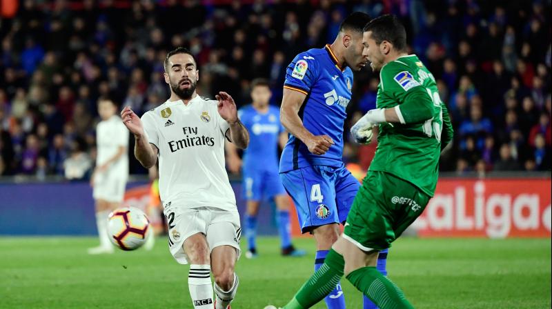 Real Madrid were mathematically ruled out of the title race after Barcelona beat Alaves on Tuesday while Atletico Madrid look likely to finish above them too for a second consecutive year. (Photo: AP) Real Madrid were mathematically ruled out of the title race after Barcelona beat Alaves on Tuesday while Atletico Madrid look likely to finish above them too for a second consecutive year. (Photo: AP)