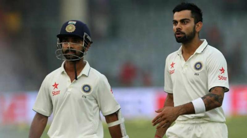 Playing alongside Ajinkya Rahane at Rising Pune Supergiants has given Steve Smith an opportunity to know him and his assessment is that the Mumbaikar is less emotional than Virat Kohli. (Photo: AFP) Playing alongside Ajinkya Rahane at Rising Pune Supergiants has given Steve Smith an opportunity to know him and his assessment is that the Mumbaikar is less emotional than Virat Kohli. (Photo: AFP)