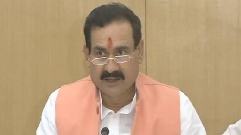Madhya Pradesh minister Narottam Mishra (Photo: ANI/Twitter) Madhya Pradesh minister Narottam Mishra (Photo: ANI/Twitter)
