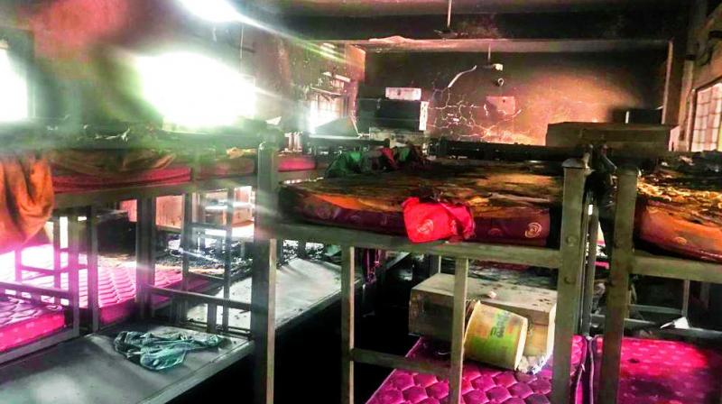 The charred room following a tubelight explosion at SC Welfare Hostel in Khammam on Tuesday. The charred room following a tubelight explosion at SC Welfare Hostel in Khammam on Tuesday.