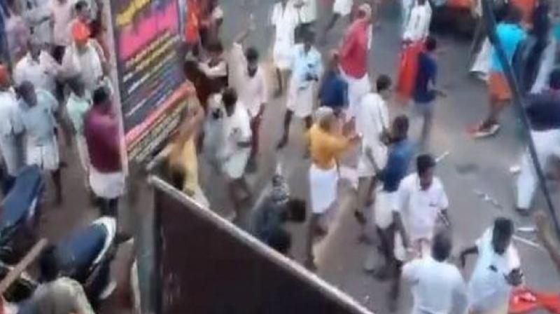 Violence was witnessed between cadres of political rivals in other parts of the state as well, forcing police to resort to lathi-charge and firing tear gas to disperse warring crowds. (Photo: Screengrab) Violence was witnessed between cadres of political rivals in other parts of the state as well, forcing police to resort to lathi-charge and firing tear gas to disperse warring crowds. (Photo: Screengrab)