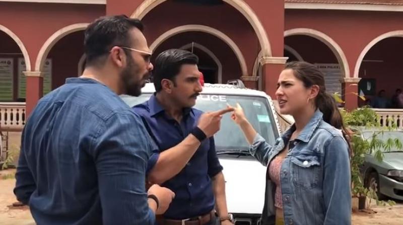 A screenshot of Ranveer Singh, Rohit Shetty, Sara Ali Khan's video from the sets of 'Simmba'. A screenshot of Ranveer Singh, Rohit Shetty, Sara Ali Khan's video from the sets of 'Simmba'.