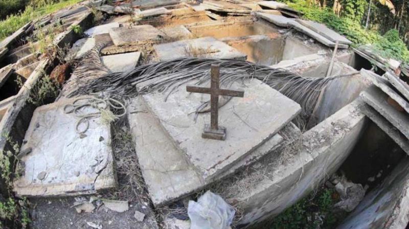 The dug up tombs of Little Flower Church, Pushpagiri Parish, Thamarassery diocese near Koodarinji, from where mortal remains were allegedly smuggled out by church authorities The dug up tombs of Little Flower Church, Pushpagiri Parish, Thamarassery diocese near Koodarinji, from where mortal remains were allegedly smuggled out by church authorities