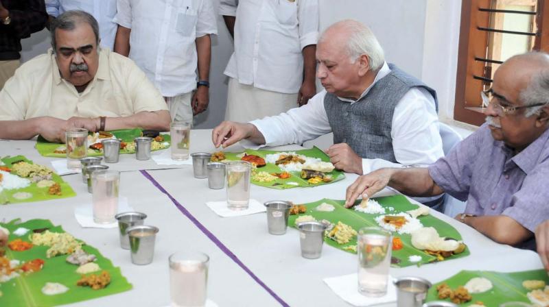 Governor Arif Muhammed Khan having lunch with his longtime friend former union minister K.P. Unnikrishnan at the latter's home at Panniyankara in Kozhikode on Saturday. (Photo: DC) Governor Arif Muhammed Khan having lunch with his longtime friend former union minister K.P. Unnikrishnan at the latter's home at Panniyankara in Kozhikode on Saturday. (Photo: DC)