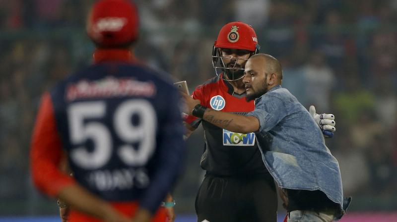 A die-hard Virat Kohli fan broke all barriers to meet the Team India skipper. (Photo: AP) A die-hard Virat Kohli fan broke all barriers to meet the Team India skipper. (Photo: AP)