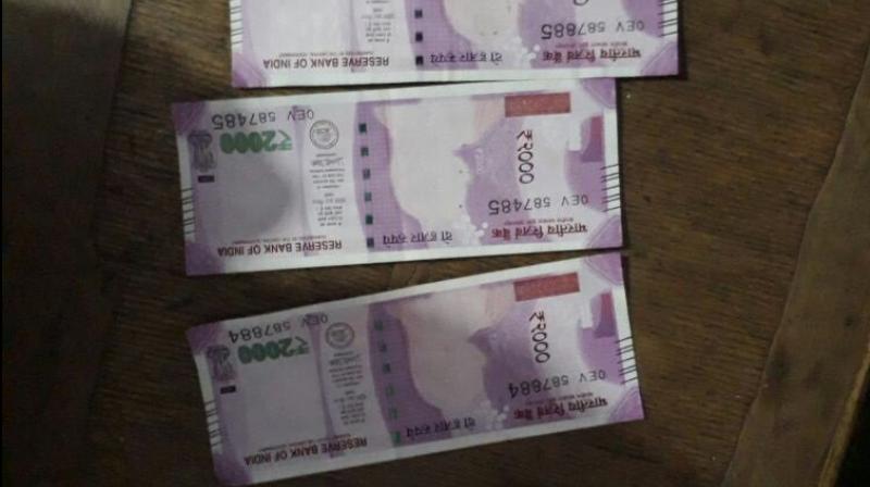 The Rs 2000 notes without Mahatma Gandhi's image. (Photo: ANI Twitter) The Rs 2000 notes without Mahatma Gandhi's image. (Photo: ANI Twitter)