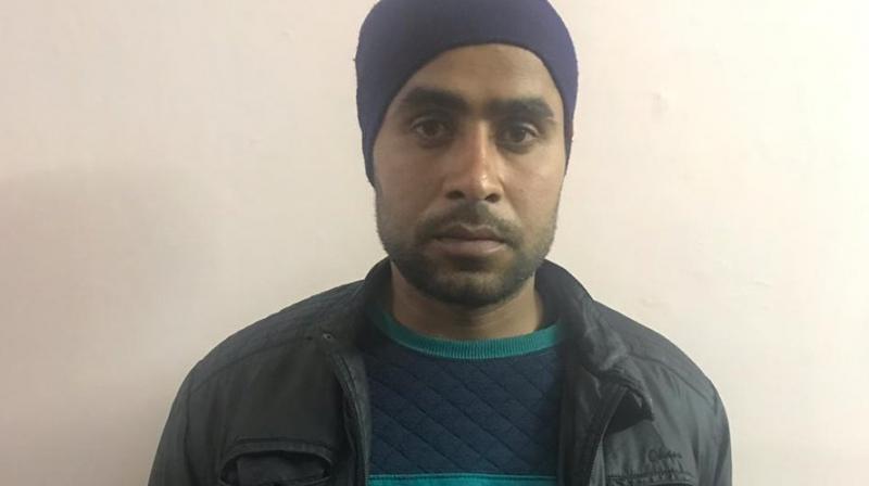 Jitendra Malik, also known as Jettu Fauji was handed over to the police by the Army. (Photo: ANI | Twitter) Jitendra Malik, also known as Jettu Fauji was handed over to the police by the Army. (Photo: ANI | Twitter)