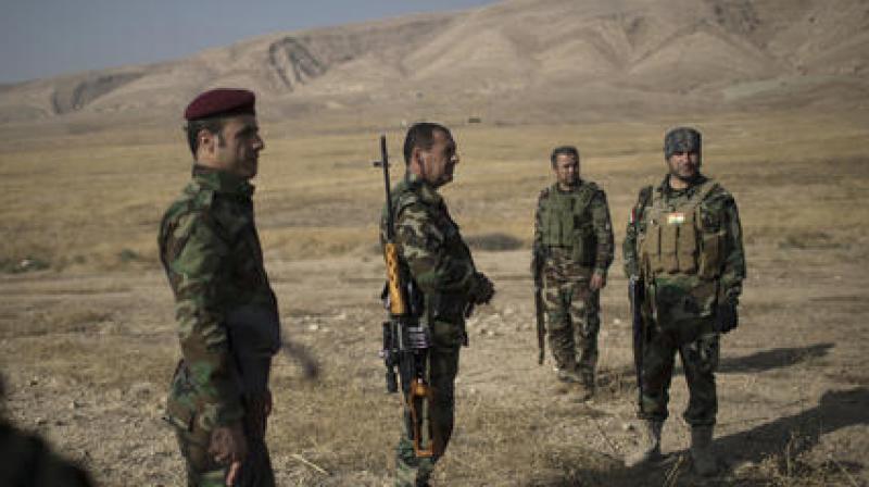 Kurdish Peshmerga fighters gather near a frontline during fighting with Islamic State militants in Bashiqa, east of Mosul. (Photo: AP) Kurdish Peshmerga fighters gather near a frontline during fighting with Islamic State militants in Bashiqa, east of Mosul. (Photo: AP)