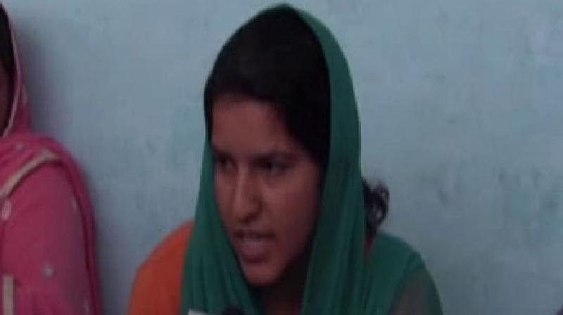 Kiren, the wife of late CRPF personnel Surender, who was killed in the attack by Naxals in Chhattisgarh. (Photo: ANI/Twitter) Kiren, the wife of late CRPF personnel Surender, who was killed in the attack by Naxals in Chhattisgarh. (Photo: ANI/Twitter)