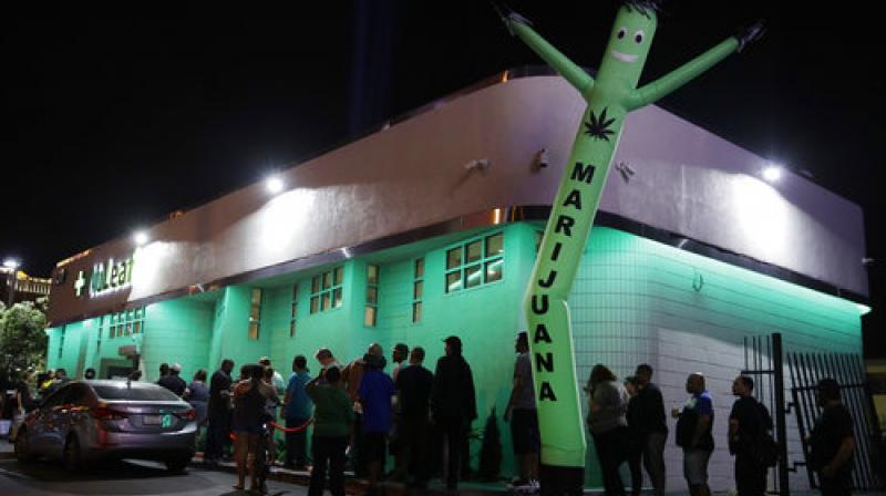 In this Saturday, July 1, 2017, photo, people line up at the NuLeaf marijuana dispensary in Las Vegas.(Photo: AP) In this Saturday, July 1, 2017, photo, people line up at the NuLeaf marijuana dispensary in Las Vegas.(Photo: AP)