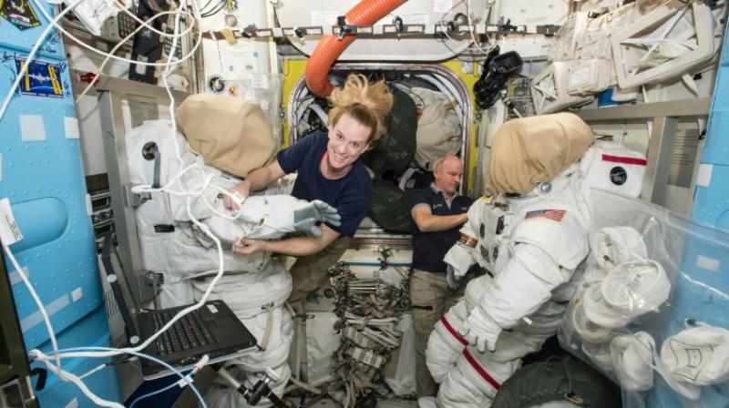 Expedition 48 crew members Kate Rubins and Jeff Williams (R) of NASA outfit spacesuits inside of the Quest airlock aboard the International Space Station in 2016 (Photo: AFP) Expedition 48 crew members Kate Rubins and Jeff Williams (R) of NASA outfit spacesuits inside of the Quest airlock aboard the International Space Station in 2016 (Photo: AFP)