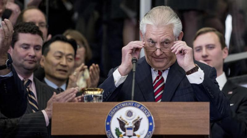 Secretary of State Rex Tillerson removes his reading glasses after speaking to State Department employees upon arrival at the State Department in Washington. (Photo: AP) Secretary of State Rex Tillerson removes his reading glasses after speaking to State Department employees upon arrival at the State Department in Washington. (Photo: AP)