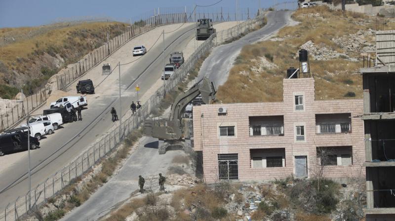 They also point out that most of the buildings are located in areas meant to be under Palestinian Authority civilian control under the agreements between the Palestinian and Israeli governments. (Photo: AFP) They also point out that most of the buildings are located in areas meant to be under Palestinian Authority civilian control under the agreements between the Palestinian and Israeli governments. (Photo: AFP)