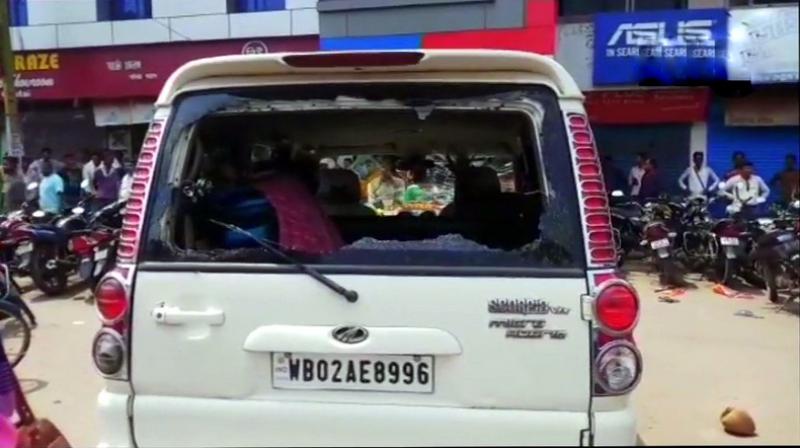 West Bengal BJP president Dilip Ghosh's car came under attack on Monday in East Midnapore district, where he arrived in the morning to attend a meeting. (Photo: Twitter | ANI) West Bengal BJP president Dilip Ghosh's car came under attack on Monday in East Midnapore district, where he arrived in the morning to attend a meeting. (Photo: Twitter | ANI)