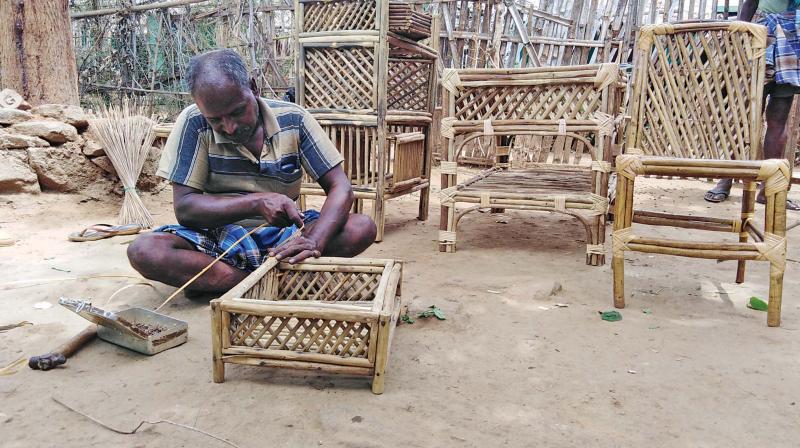 Mallappa makes furniture with branches of the Lantana Camara.(Photo: DC) Mallappa makes furniture with branches of the Lantana Camara.(Photo: DC)