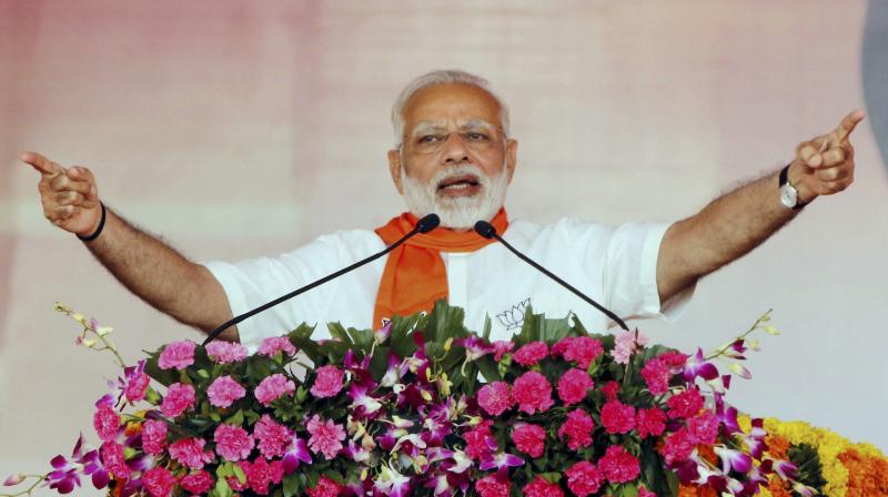 Sounding the poll bugle for Gujarat Assembly election, Prime Minister Narendra Modi said he wishes Congress to fight for once on the issue of development. (Photo: PTI) Sounding the poll bugle for Gujarat Assembly election, Prime Minister Narendra Modi said he wishes Congress to fight for once on the issue of development. (Photo: PTI)