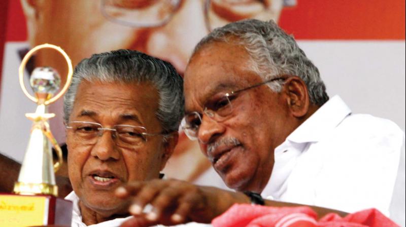 Chief Minister Pinarayi Vijayan shares a moment with CITU state president Kattakada Sasi at the 13th state meet of the Kerala Headload and General Workers Federation at the Thirunakkara in Kotayam on Thursday. (Photo: Rajeev Prasad) Chief Minister Pinarayi Vijayan shares a moment with CITU state president Kattakada Sasi at the 13th state meet of the Kerala Headload and General Workers Federation at the Thirunakkara in Kotayam on Thursday. (Photo: Rajeev Prasad)